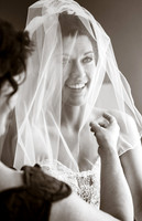 Happy Bride with Wedding Veil Covering Face