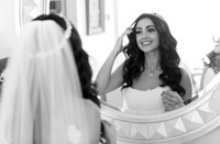 Bride Looking in Mirror