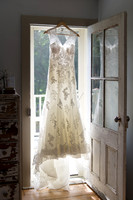 Bridal Gown Hanging on Door Frame