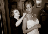 Mother putting necklace on Bride - Poughkeepsie, NY