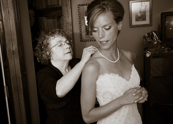 Mother putting necklace on Bride - Poughkeepsie, NY