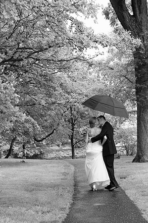 Bride Groom Kissing in Rain