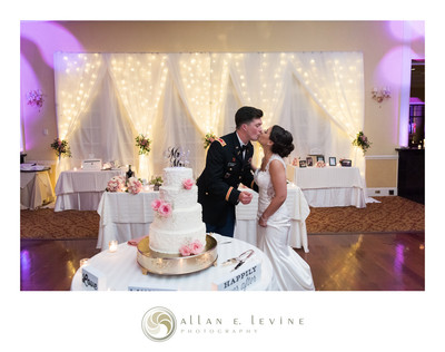 Bride & Groom with Wedding Cake