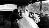 Bride Groom Kissing in Rolls