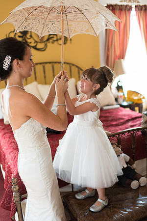 Bride with Parasol and Flower Girl