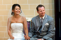 Bride & Groom at Alter Smiling